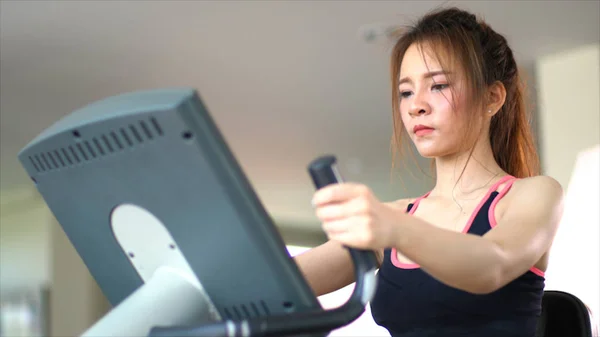 The sport woman work out with walk machine in Gym — Stock Photo, Image