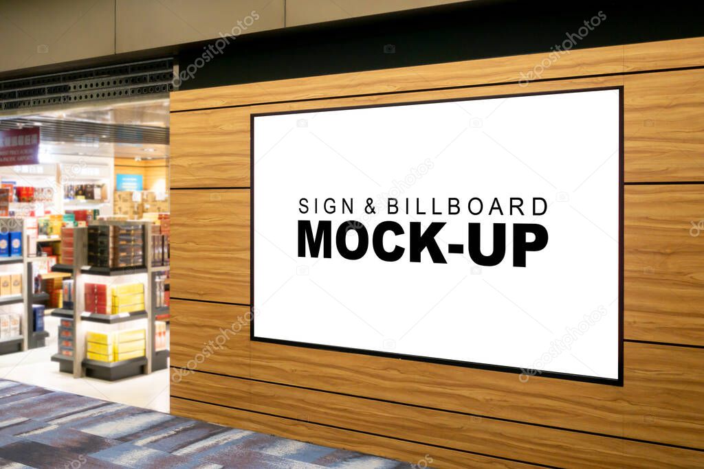 Mock up blank billboard on panel at showroom in airport