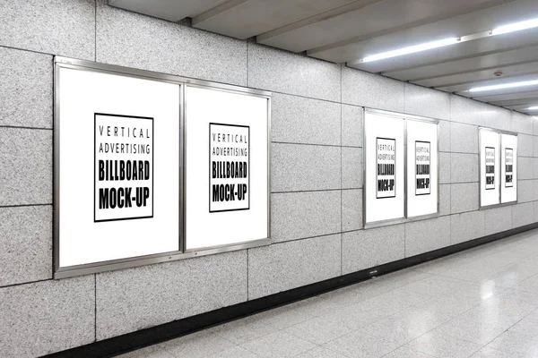 Mock up perspective blank horizontal billboard with clipping path lined on the wall and walkway in metro station, blurred people, empty space for advertising or information, advertising concept