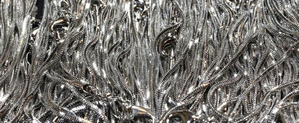 Necklaces of shiny anodized aluminum and braided — Stock Photo, Image