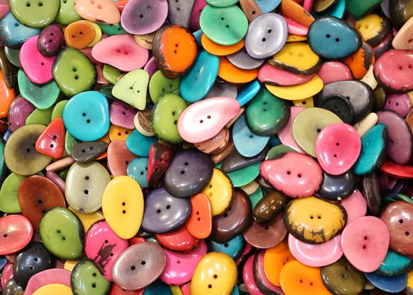 Фон из разноцветных кнопок из сушеных пальмовых семян для SA — стоковое фото