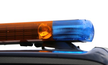 Turuncu ve mavi yanıp sönen ışıklar polis arabasının