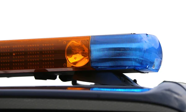 Orange und blaue Blinklichter des Polizeiautos — Stockfoto