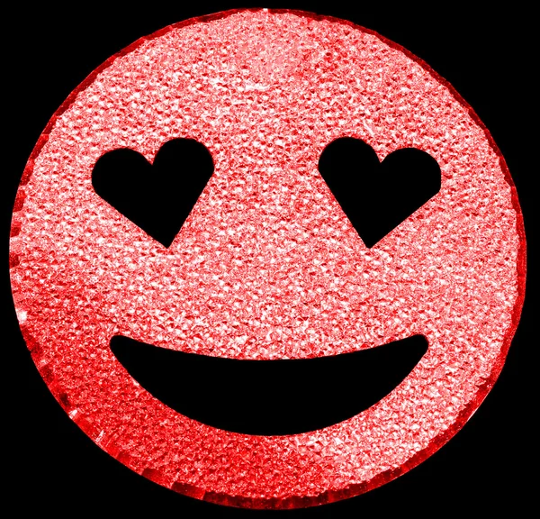 Red smiling face shining with heart-shaped eyes — Stockfoto