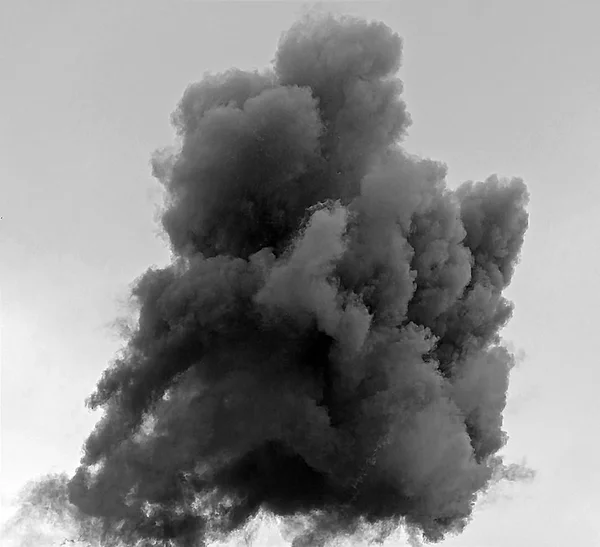 Black cloud of the explosion in the sky — Stock Photo, Image
