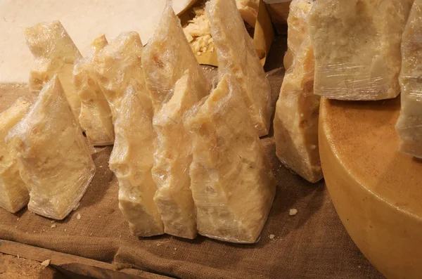 Italian Parmesan on sale in the mountain dairy farm — Stock Photo, Image