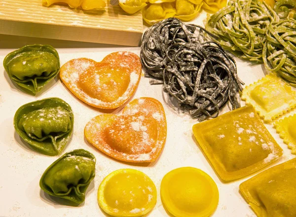 Italian pasta and tortellini stuffed heart-shaped — Stock Photo, Image