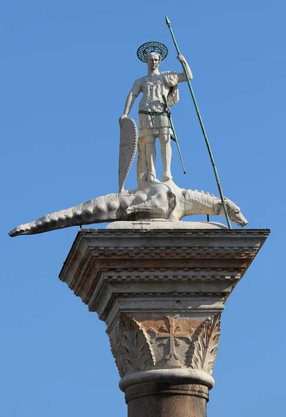 Statue of saintTheodore slaying the dragon over the column in th — Stock Photo, Image