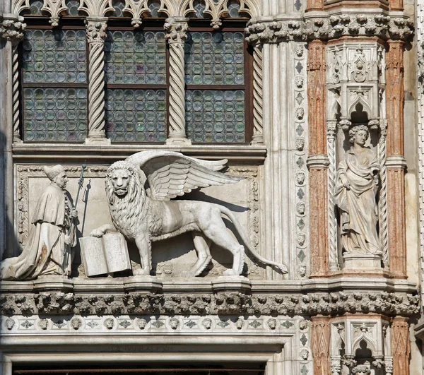 Statue of the winged lion on the Basilica of Saint Mark in Venic Stock Image