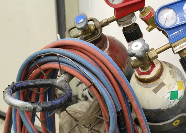 Tank with gas for soldering iron with a blowtorch — Stock Photo, Image