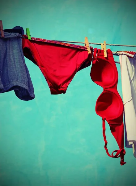 Old Underwear Hanging In The Sun Stock Photo, Picture and Royalty