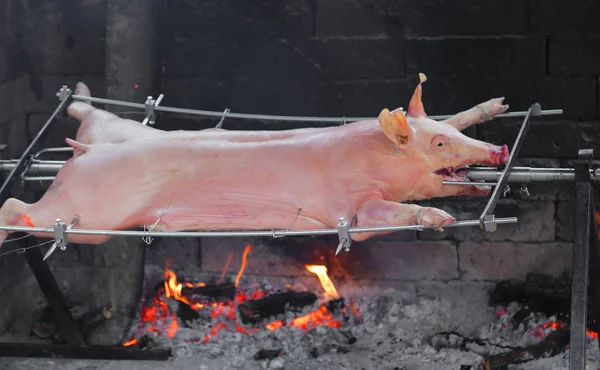 Big quartered pig cooked — Stock Photo, Image