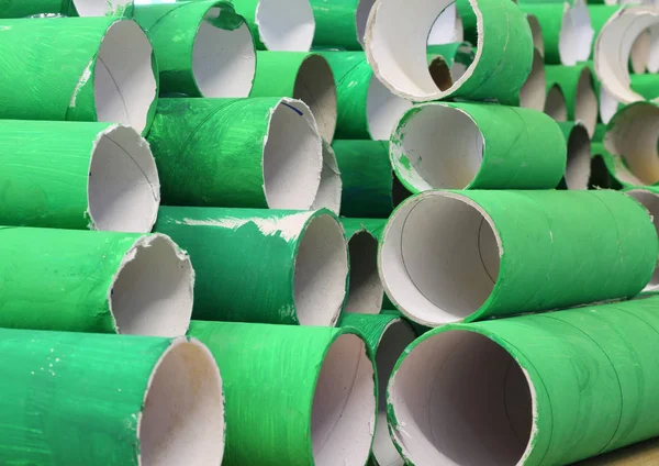 Green cardboard rolls — Stock Photo, Image