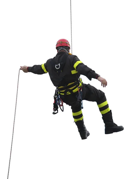 登山者戴红色头盔的消防员 — 图库照片