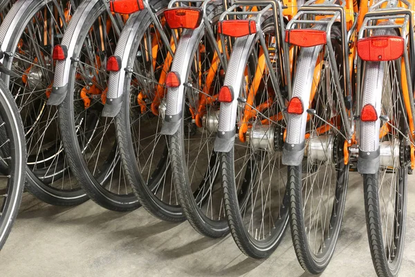 Rear wheels and mudguard of orange bicycle — Stock Photo, Image