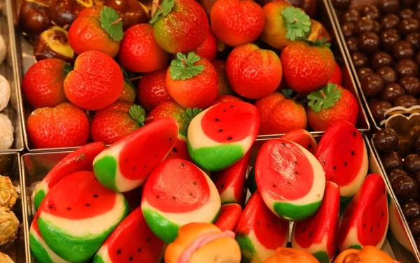 Fruit-shaped marzipan in baskets at a shop — Stock Photo, Image