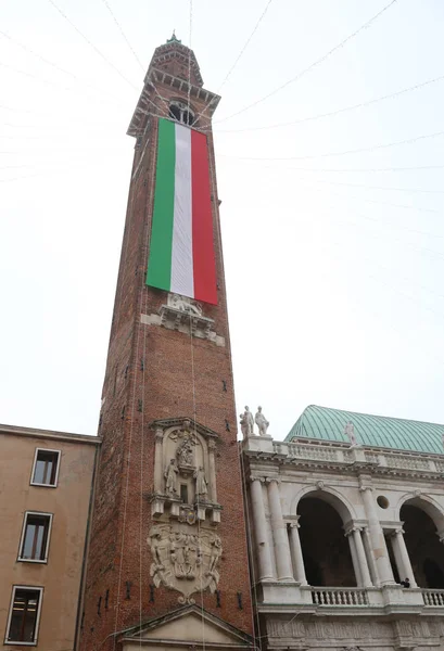 Vicenza Italy Tower on the square of town and a italian flag — Stock Photo, Image