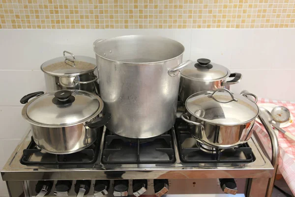 Pots in the industrial kitchen on the stove inside the restauran — Stock Photo, Image