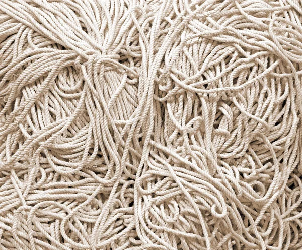 Fundo de cordas longas brancas cruas — Fotografia de Stock