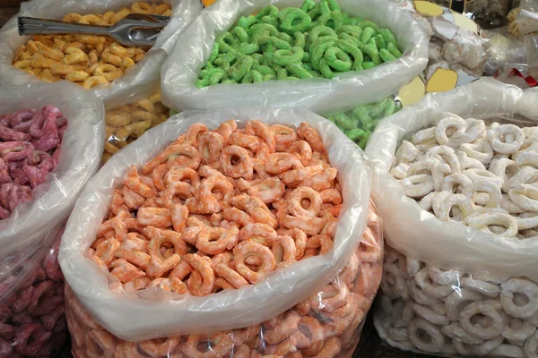 Tarallini of many colors on sale in the bakery of southern Italy — Stock Photo, Image