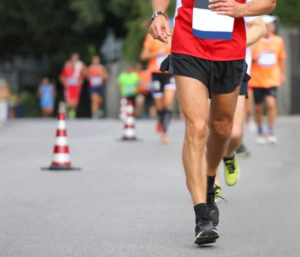 Atleta correndo durante a maratona — Fotografia de Stock