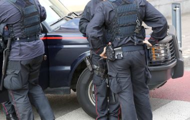 policeman in riot gear during a roadblock to control in national clipart