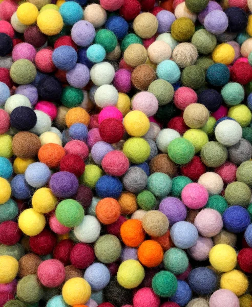 Background of multicolored felt balls — Stock Photo, Image