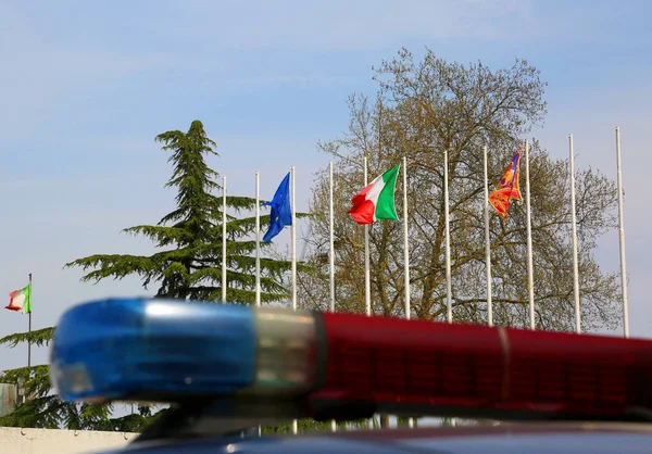 Police car sirens with blurry effect and European and Italian fl — Stock Photo, Image