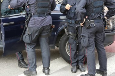 f policeman in riot gear during a roadblock to control the terro clipart