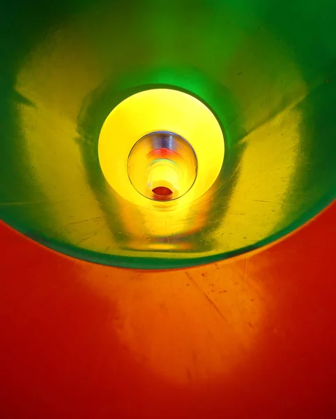Fondo abstracto de túnel de plástico en muchos colores — Foto de Stock