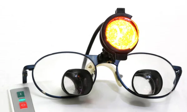 Glasses and an infrared light spot for chirurgic operations in s — Stock Photo, Image