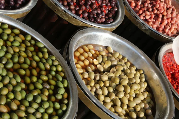 Stall with Mediterranean olives and other products for sale — Stock Photo, Image