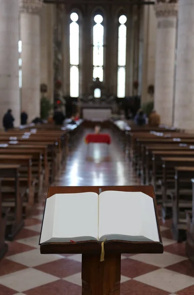 Old Holy Bible inside a church — Stock Photo, Image