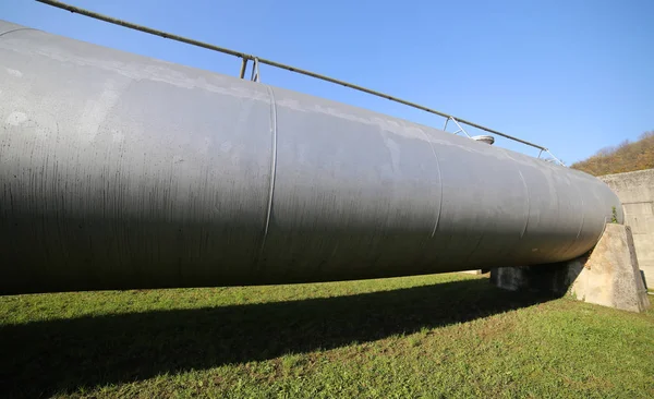 Steel pipe for the transport of gas or oil in the laying stage — Stock Photo, Image