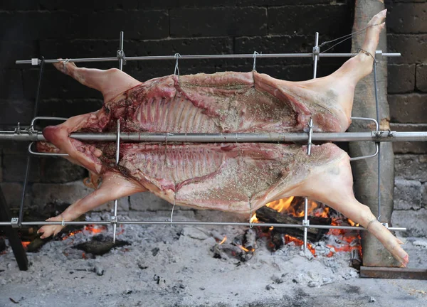 Skewer of a roasted pork with slow fire — Stock Photo, Image