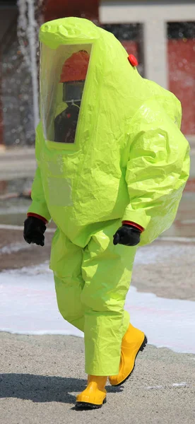 Firefighter with protective suit against  bacteriological agents — Stock Photo, Image