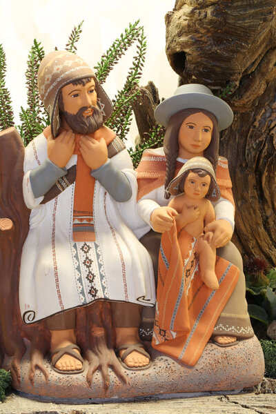 Peruvian family symbolizing the holy family of Jesus in earthenw