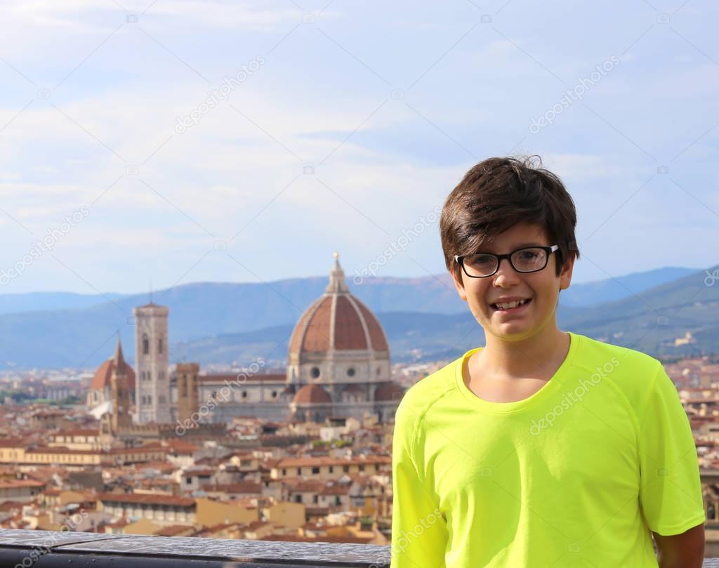 Smiling boy in the city of FLORENCE in Italy