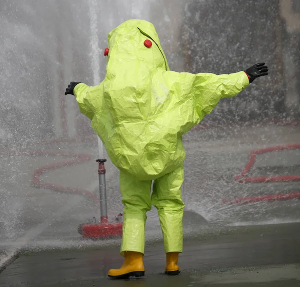 Yellow protective suit with air filtering system to breathe duri — Stock Photo, Image