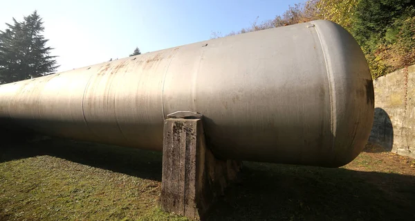 Huge gas storage tanks in an industrial area.