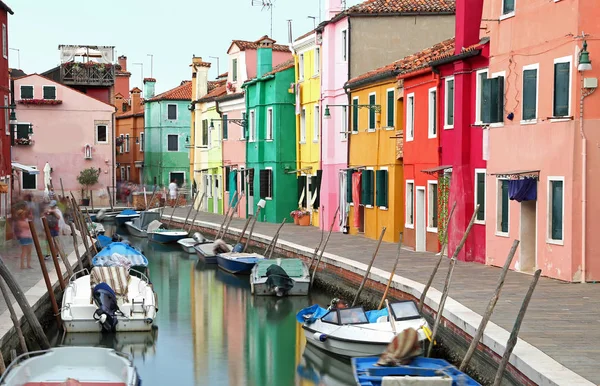 Houses on Burano Island  in Venice in Italy with the boats sligh Stock Photo