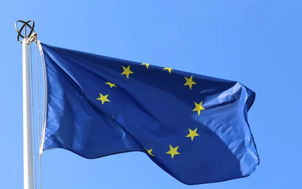 European flag with yellow stars and blue sky — Stock Photo, Image