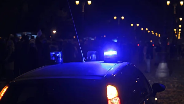 Blue lights sirens of a police car in the city — Stock Photo, Image