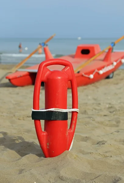 Lifebuoy and lifeguard rescue boat — Stock Photo, Image