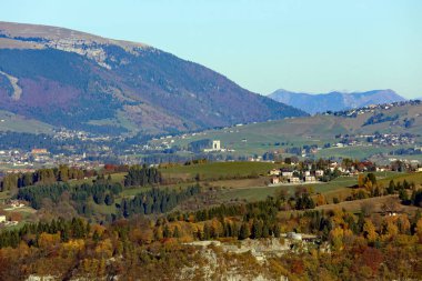 panorama of the italian mountains with the town of Asiago and th clipart