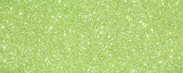 Bakgrunden grön glittrade med glittrande ljus och speglar — Stockfoto