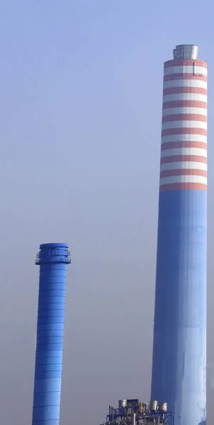 Chimneys of an industrial plant for the disposal of the remittan — Stock Photo, Image