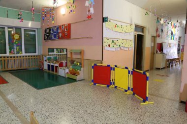 game room in an asylum to educate small children clipart