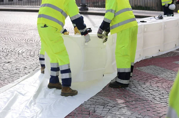 civil protection men with high visibility clothing during an exe