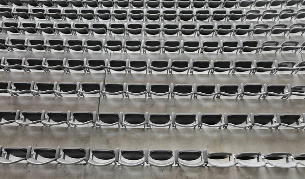 Background of gray chairs without the spectators — Stock Photo, Image